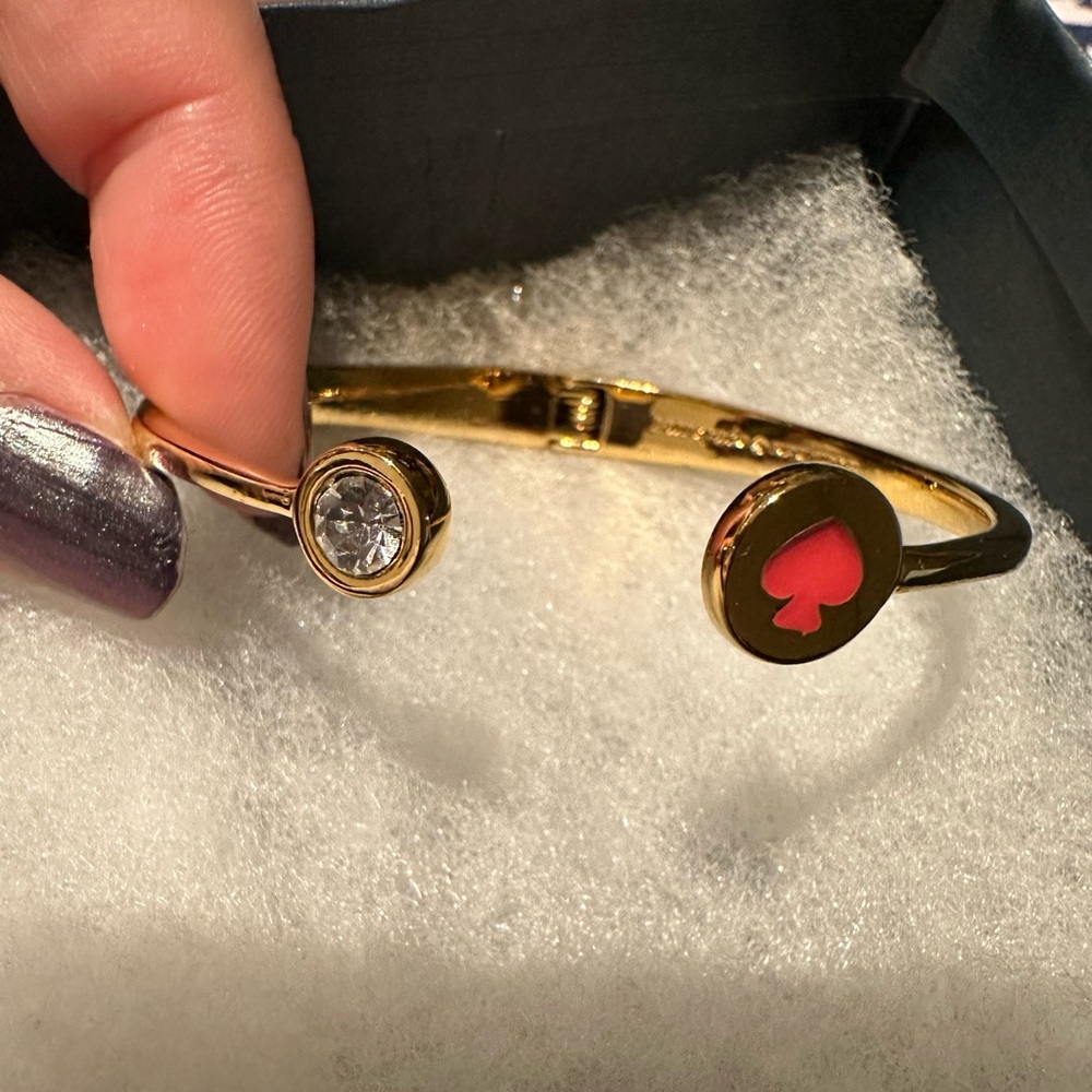 Kate Spade gold tone bangle bracelet